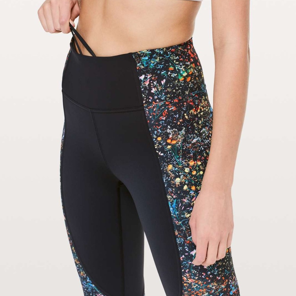 Lululemon Wake and Train Tight in the Black/Flowerescent Multi color.